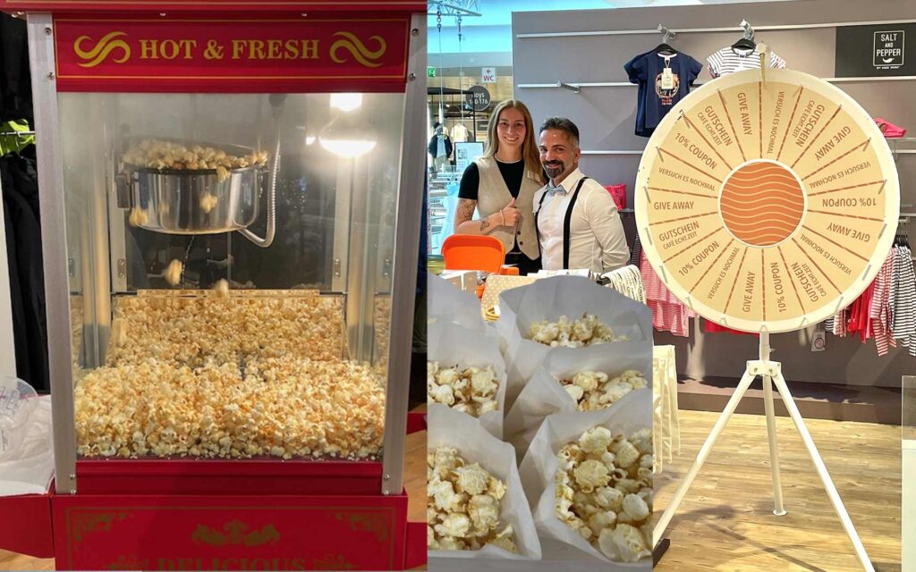 Popcorn aus der Popcornmaschine und Glücksrad