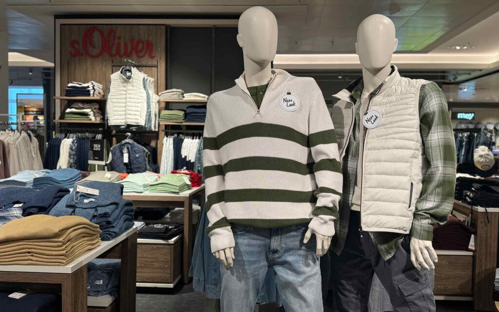 Zwei Figuren vor der S. Oliver Fläche in Posthausen