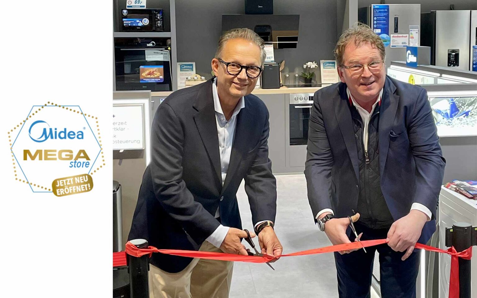 Ralph Dodenhof und Ralph Kobsik schneiden Band durch