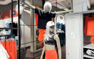 Schwarze und orange Sportmode für Kinder